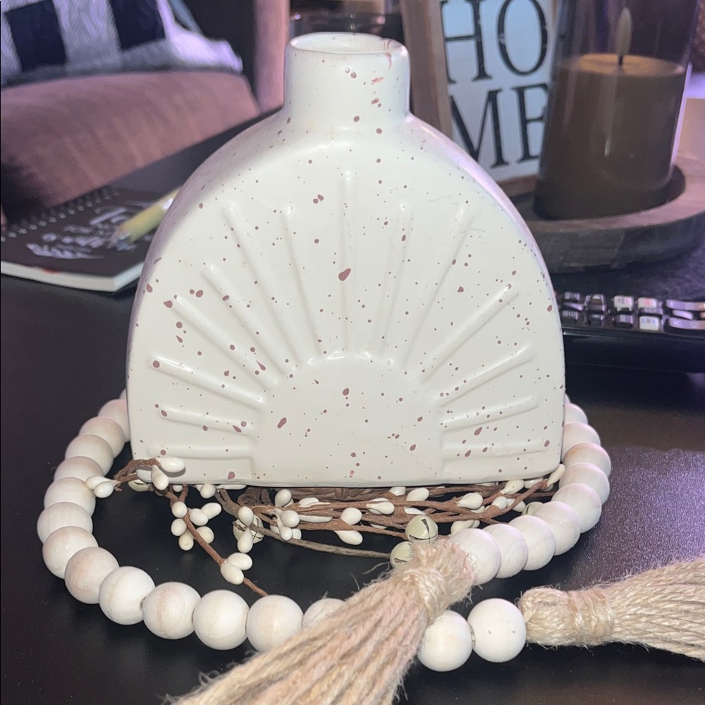 Small, White Speckled Ceramic Vase , no decor included.